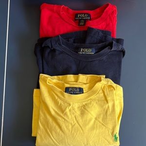 (3) polo cotton t-shirts. Red, navy and yellow